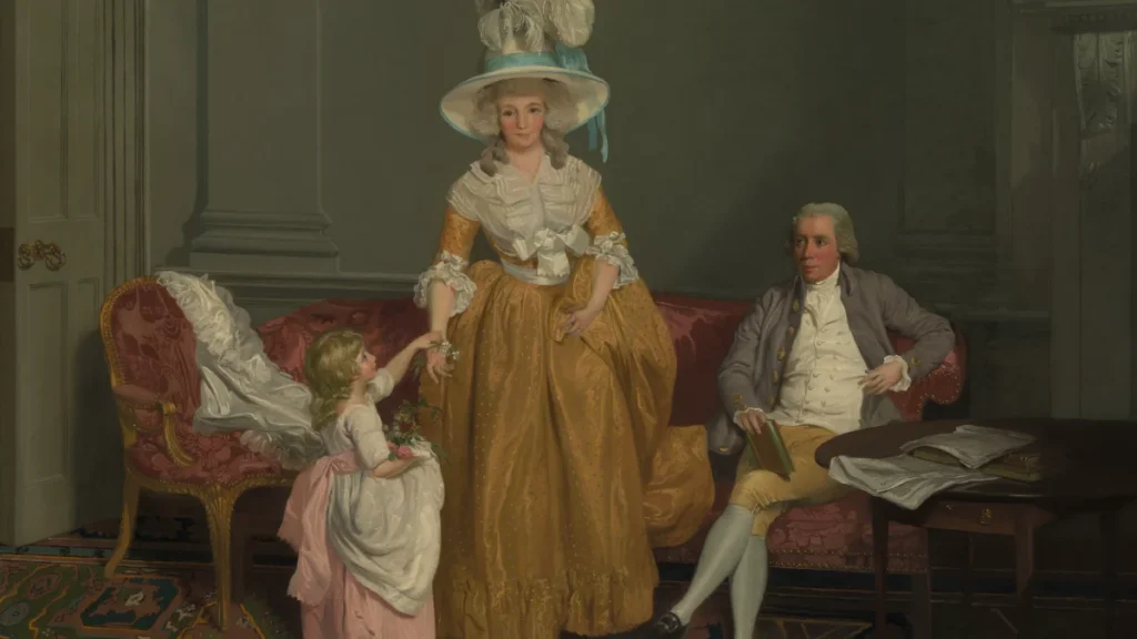 Tranh “Gia đình Saithwaite” (Francis Wheatley, khoảng 1785), cha mẹ cùng con nhỏ trong phòng khách, minh họa bài về nam giới nghỉ thai sản