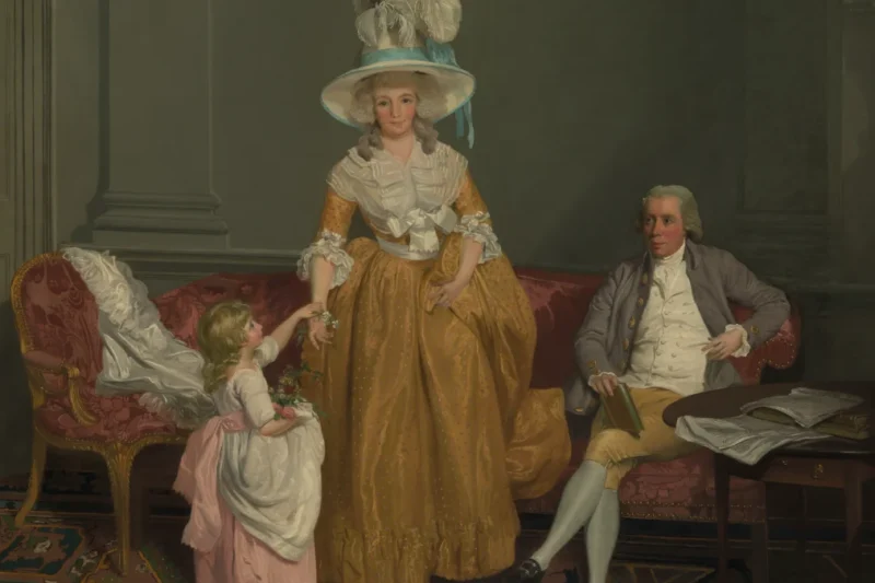 Tranh “Gia đình Saithwaite” (Francis Wheatley, khoảng 1785), cha mẹ cùng con nhỏ trong phòng khách, minh họa bài về nam giới nghỉ thai sản