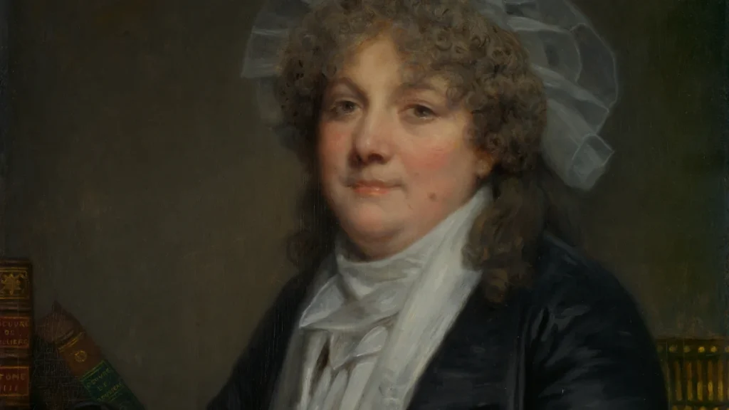 Tranh chân dung bà Jean-Baptiste Nicolet (Jean-Baptiste Greuze, cuối thập niên 1780), người phụ nữ điềm tĩnh bên bàn, minh họa bài về nữ lãnh đạo ngành truyền thông